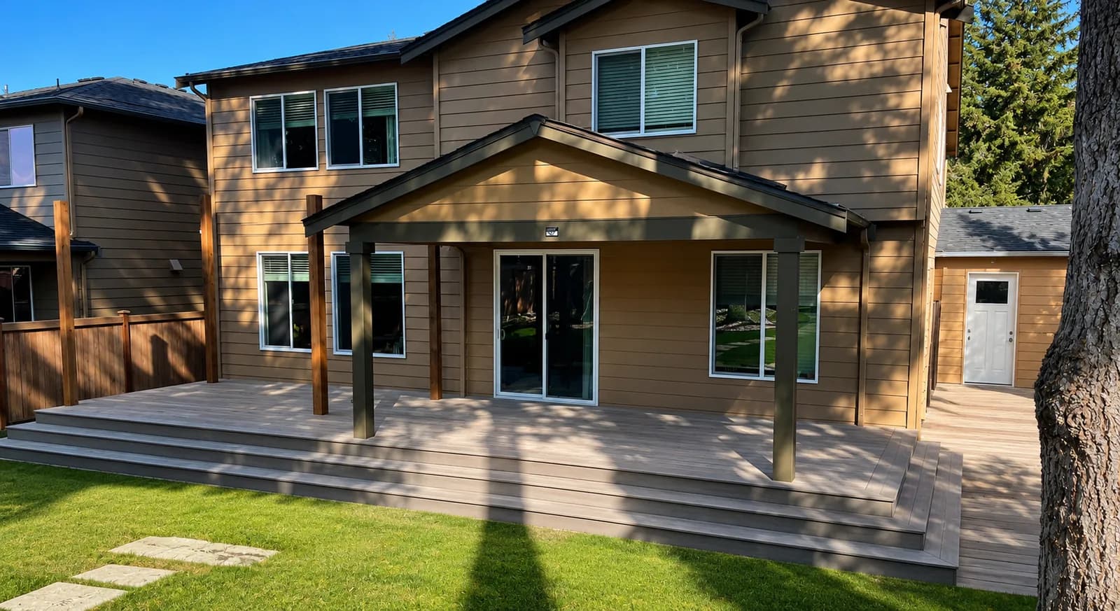 Permitted multi-level deck on a two-story Pacific Northwest home